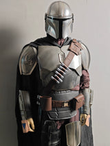 The Mandalorian Armor invludes everything in the picture, including helt, body armor pieces, undersuit, gloves. boots, body accessories and cape.